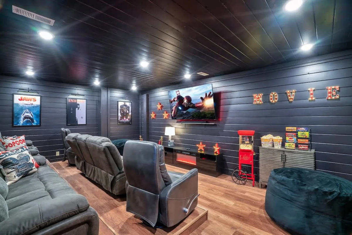 Second movie room at Big Star Lodge with leather recliners, popcorn cart and bean bags