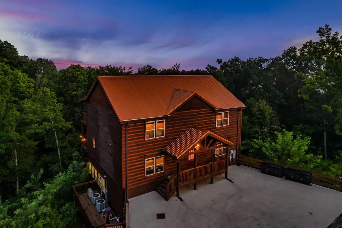 Blue Smoke Lodge at twilight — 6 bedroom cabin with indoor pool, Sevierville TN