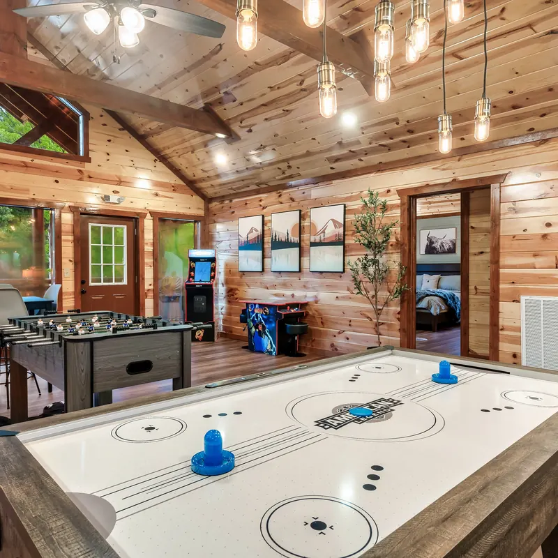 Air hockey and foosball in a game room