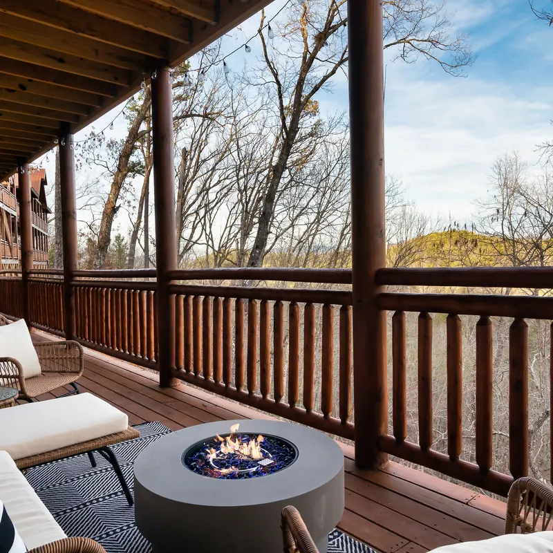Covered deck with fire table and mountain view