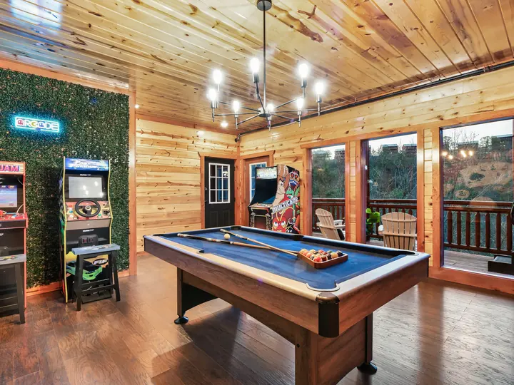 Game room with pool table and mountain view