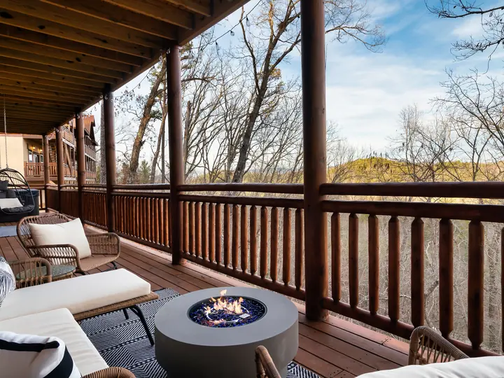 Covered deck with lounge seating and a mountain view